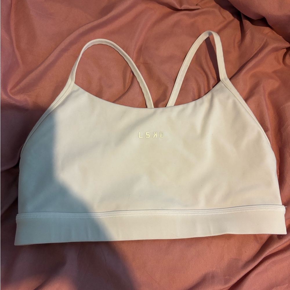 White LSKD halter sports bra